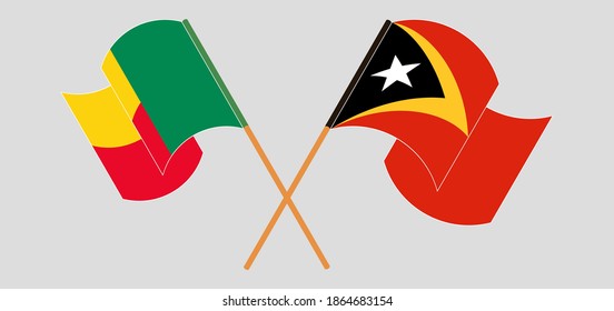 Crossed and waving flags of Benin and East Timor