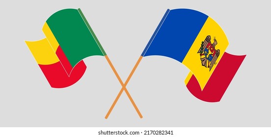 Crossed and waving flags of Benin and Moldova. Vector illustration
