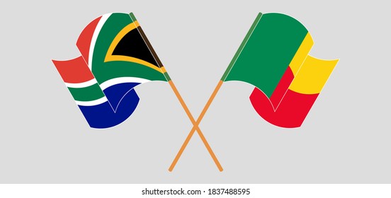 Crossed and waving flags of Benin and Republic of South Africa