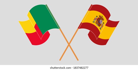 Crossed and waving flags of Benin and Spain