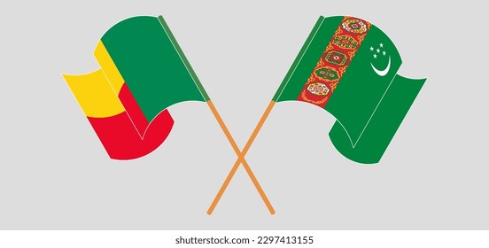Crossed and waving flags of Benin and Turkmenistan