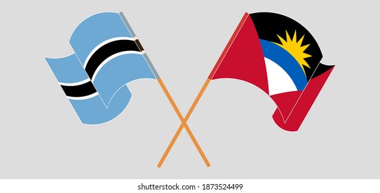 Banderas cruzadas y ondeando banderas de Botswana y Antigua y Barbuda
