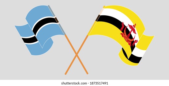 Crossed and waving flags of Botswana and Brunei