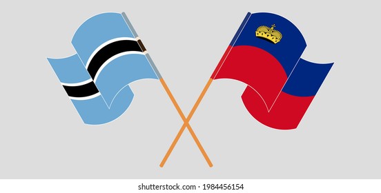 Crossed and waving flags of Botswana and Liechtenstein