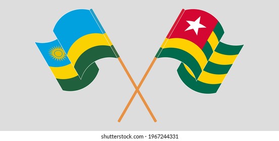Banderas cruzadas y ondeando banderas de Botswana y Togo