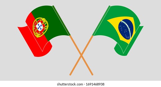 Crossed and waving flags of Brazil and Portugal