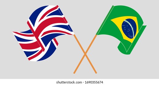 Crossed and waving flags of Brazil and the UK