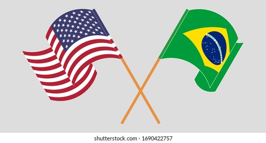 Crossed and waving flags of Brazil and the USA