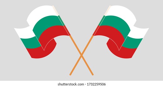 Banderas cruzadas y ondeando banderas de Bulgaria