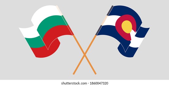 Banderas cruzadas y ondeando banderas de Bulgaria y el Estado de Colorado
