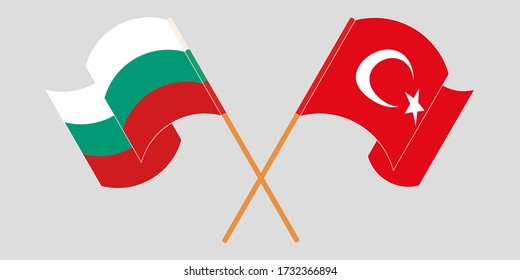 Crossed and waving flags of Bulgaria and Turkey