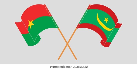 Gekreuzte und schwellende Flaggen von Burkina Faso und Mauretanien. Vektorgrafik
