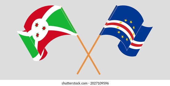 Crossed and waving flags of Burundi and Cape Verde