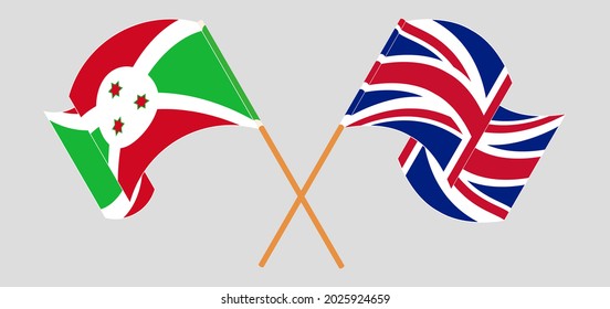 Crossed and waving flags of Burundi and the UK