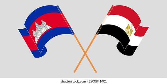 Crossed and waving flags of Cambodia and Egypt. Vector illustration
