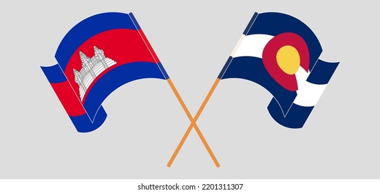 Crossed and waving flags of Cambodia and The State of Colorado. Vector illustration
