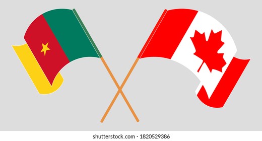 Crossed and waving flags of Cameroon and Canada
