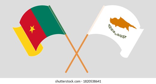 Crossed and waving flags of Cameroon and Cyprus