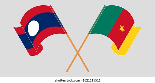 Crossed and waving flags of Cameroon and Laos