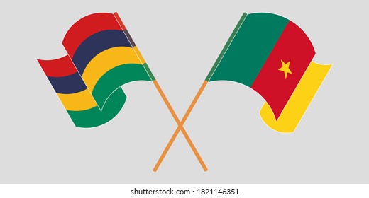 Banderas cruzadas y ondeando banderas de Camerún y Mauricio