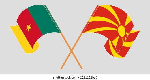Gekreuzte und wehende Flaggen Kameruns und Nordmakedonien
