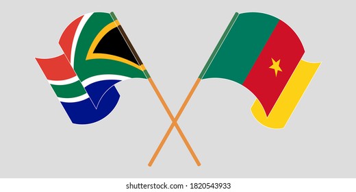Crossed and waving flags of Cameroon and Republic of South Africa