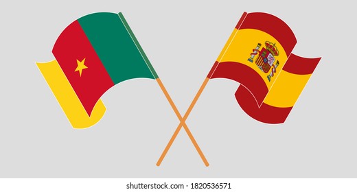 Crossed and waving flags of Cameroon and Spain
