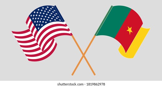 Crossed and waving flags of Cameroon and the USA
