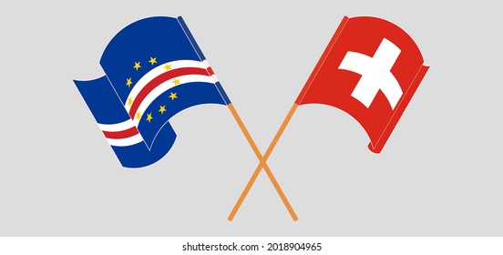 Crossed and waving flags of Cape Verde and Switzerland