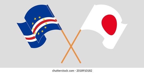 Crossed and waving flags of Cape Verde and Japan