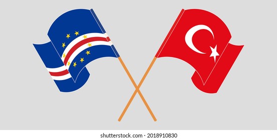 Crossed and waving flags of Cape Verde and Turkey
