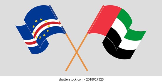 Crossed and waving flags of Cape Verde and the United Arab Emirates