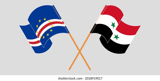 Crossed and waving flags of Cape Verde and Syria