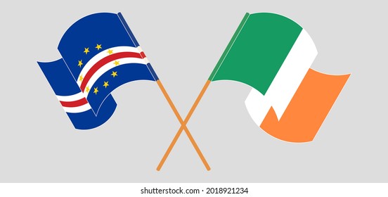 Crossed and waving flags of Cape Verde and Ireland