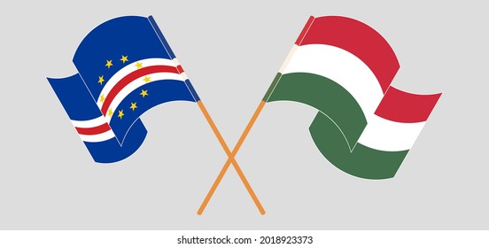 Crossed and waving flags of Cape Verde and Hungary