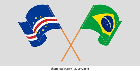 Crossed and waving flags of Cape Verde and Brazil