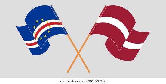 Crossed and waving flags of Cape Verde and Latvia