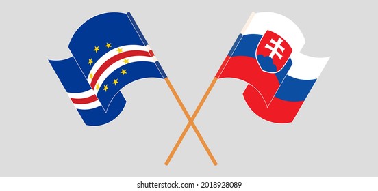 Crossed and waving flags of Cape Verde and Slovakia