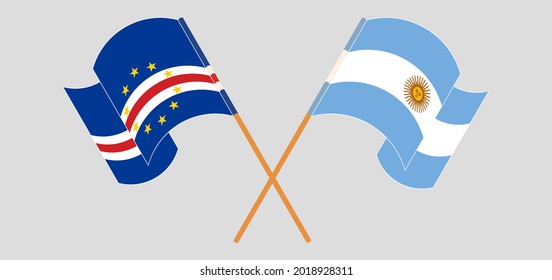 Crossed and waving flags of Cape Verde and Argentina