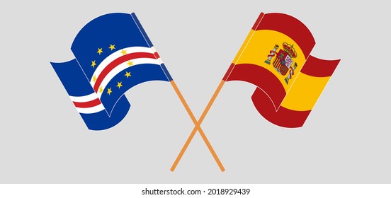 Crossed and waving flags of Cape Verde and Spain