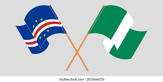 Crossed and waving flags of Cape Verde and Nigeria