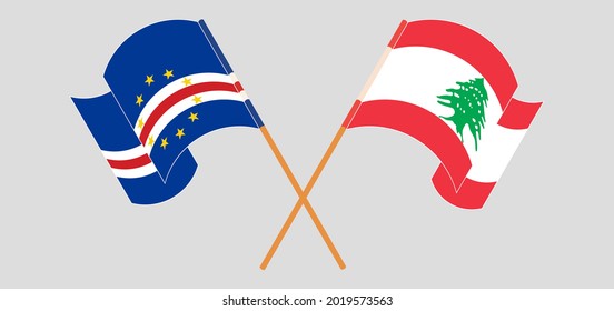 Crossed and waving flags of Cape Verde and the Lebanon