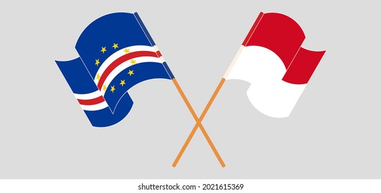 Crossed and waving flags of Cape Verde and Monaco