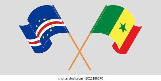 Crossed and waving flags of Cape Verde and Senegal