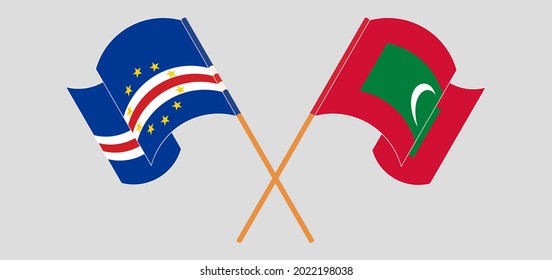 Crossed and waving flags of Cape Verde and Maldives