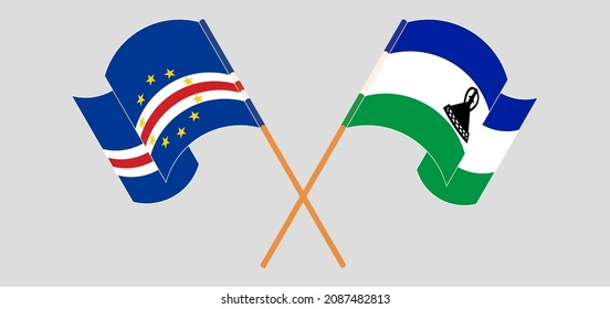 Crossed and waving flags of Cape Verde and Kingdom of Lesotho. Vector illustration
