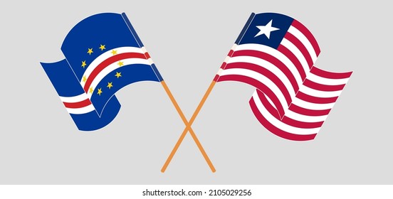 Crossed and waving flags of Cape Verde and Liberia. Vector illustration
