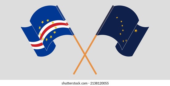 Crossed and waving flags of Cape Verde and the State of Alaska. Vector illustration
