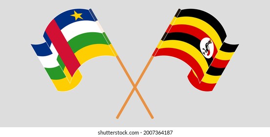 Banderas cruzadas y ondeando banderas de la República Centroafricana y Uganda