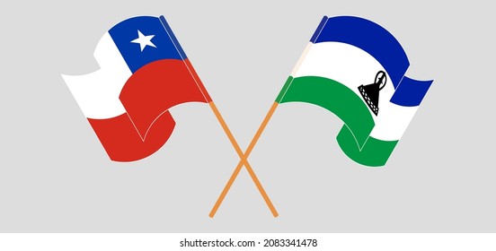 Banderas cruzadas y ondeando banderas de Chile y el Reino de Lesoto. Ilustración del vector
